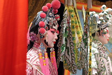 Image showing chinese opera dummy and red cloth as text space ,it is a toy,not