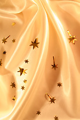 Image showing New year holiday golden silk as background 