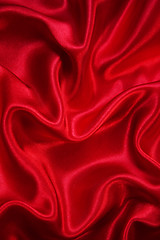 Image showing Smooth elegant red silk as background 