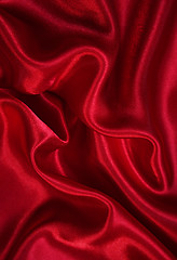 Image showing Smooth elegant red silk as background 