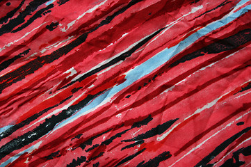 Image showing Blue, black and red strips on the fabric as background