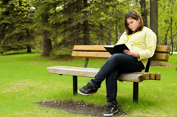 Image showing Reading In The Park