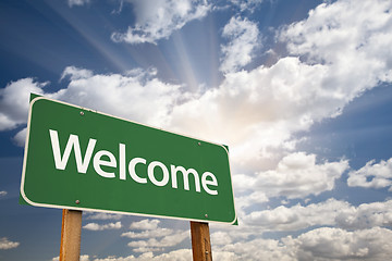 Image showing Welcome Green Road Sign Against Clouds