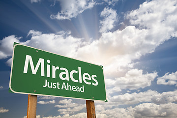 Image showing Miracles Green Road Sign Against Clouds