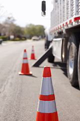 Image showing Orange Hazard Safety Cones and Work Truck