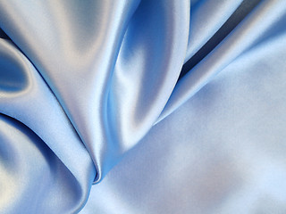 Image showing Smooth elegant blue silk as background 