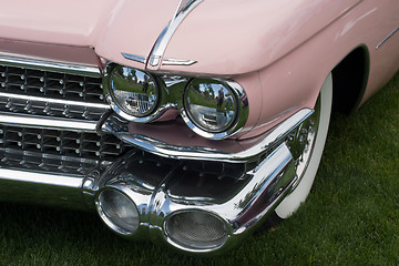 Image showing Front side of a pink classic car