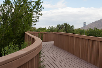 Image showing Board Walk trough green bushes