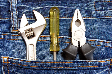 Image showing tools and jeans