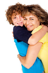 Image showing Grandmother and grandson hugging each other