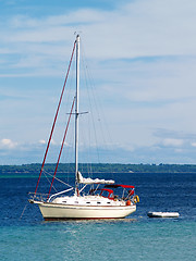 Image showing sailboat anchored in harbor