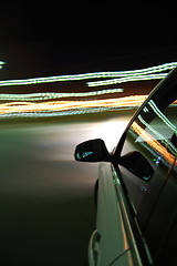 Image showing night drive with car in motion 