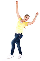 Image showing Happy teen enjoying music and dancing