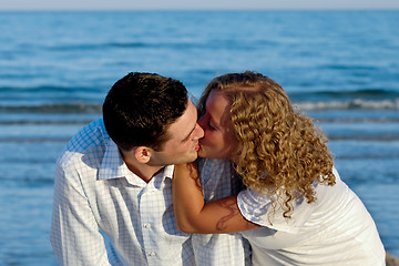 Image showing Young couple are kissing.