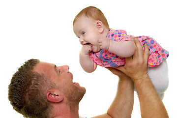 Image showing Father and baby are playing