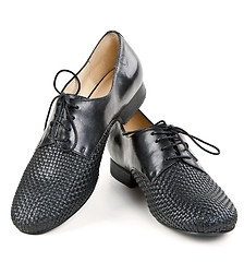 Image showing stylish pair of black leather shoes