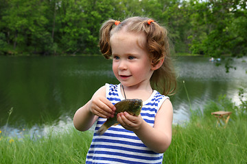 Image showing fishing - littlle girl with catching fish