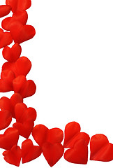 Image showing Petals in heart shape over white background - frame. Clipping path included.