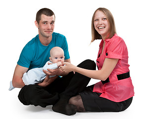 Image showing Mom and Dad with a baby