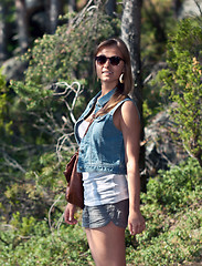 Image showing girl in sunglasses in the woods