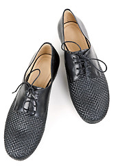 Image showing stylish pair of black leather shoes