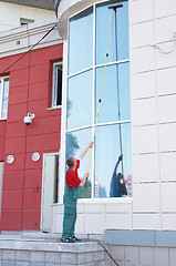 Image showing Cleaning office window