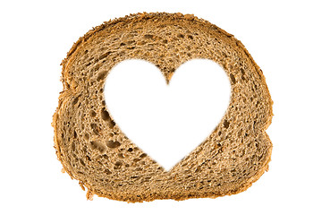 Image showing Heart shaped hole in a slice of bread