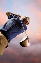 Image showing golfer shooting a golf ball