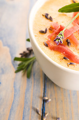 Image showing fresh melon soup with parma ham and lavender flower