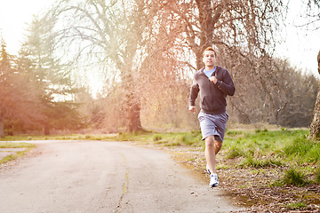 Image showing Mixed race man running