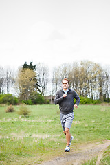 Image showing Mixed race man running