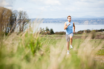 Image showing Mixed race man running