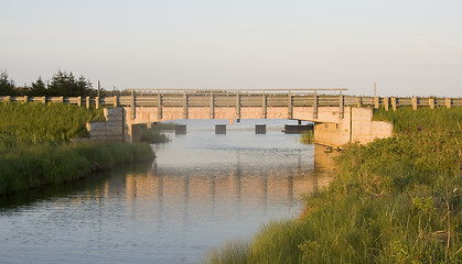 Image showing Sunrise on a bridge