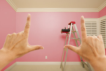 Image showing Hands Framing Pink Painted Wall Interior