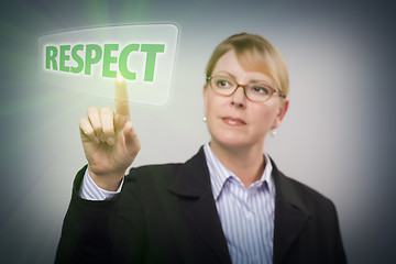 Image showing Woman Pushing Respect Button on Interactive Touch Screen