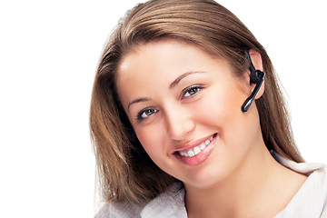 Image showing young beautiful business woman with headsetling