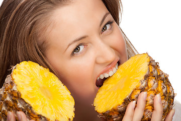 Image showing lovely blonde with pineapple