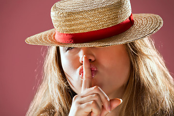 Image showing blond woman and straw bonnet