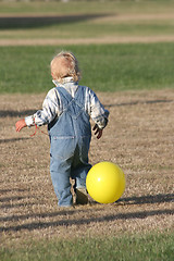Image showing boy with yellow balloon