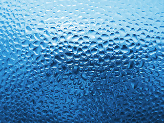 Image showing natural water drops on glass