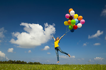 Image showing Flying with balloons