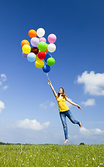 Image showing Flying with balloons