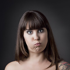 Image showing Funny woman with full cheeks