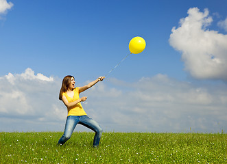 Image showing Holding a balloon