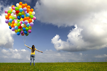 Image showing Girl with colorful balloons