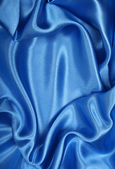 Image showing Smooth elegant blue silk as background 