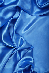 Image showing Smooth elegant blue silk as background 