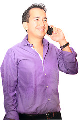 Image showing a man using a cell phone on a white background 