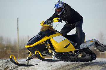 Image showing Flying of ski mobile rider