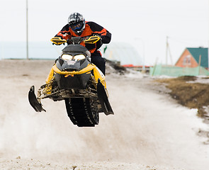 Image showing Snow mobile jump